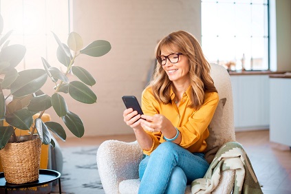 Middle aged woman at home relaxing