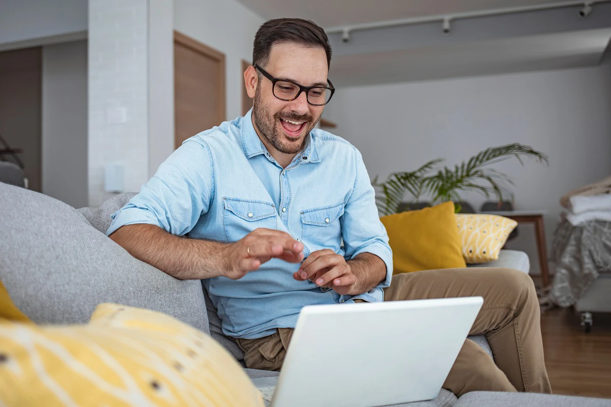 Man Using Video Chat At Home