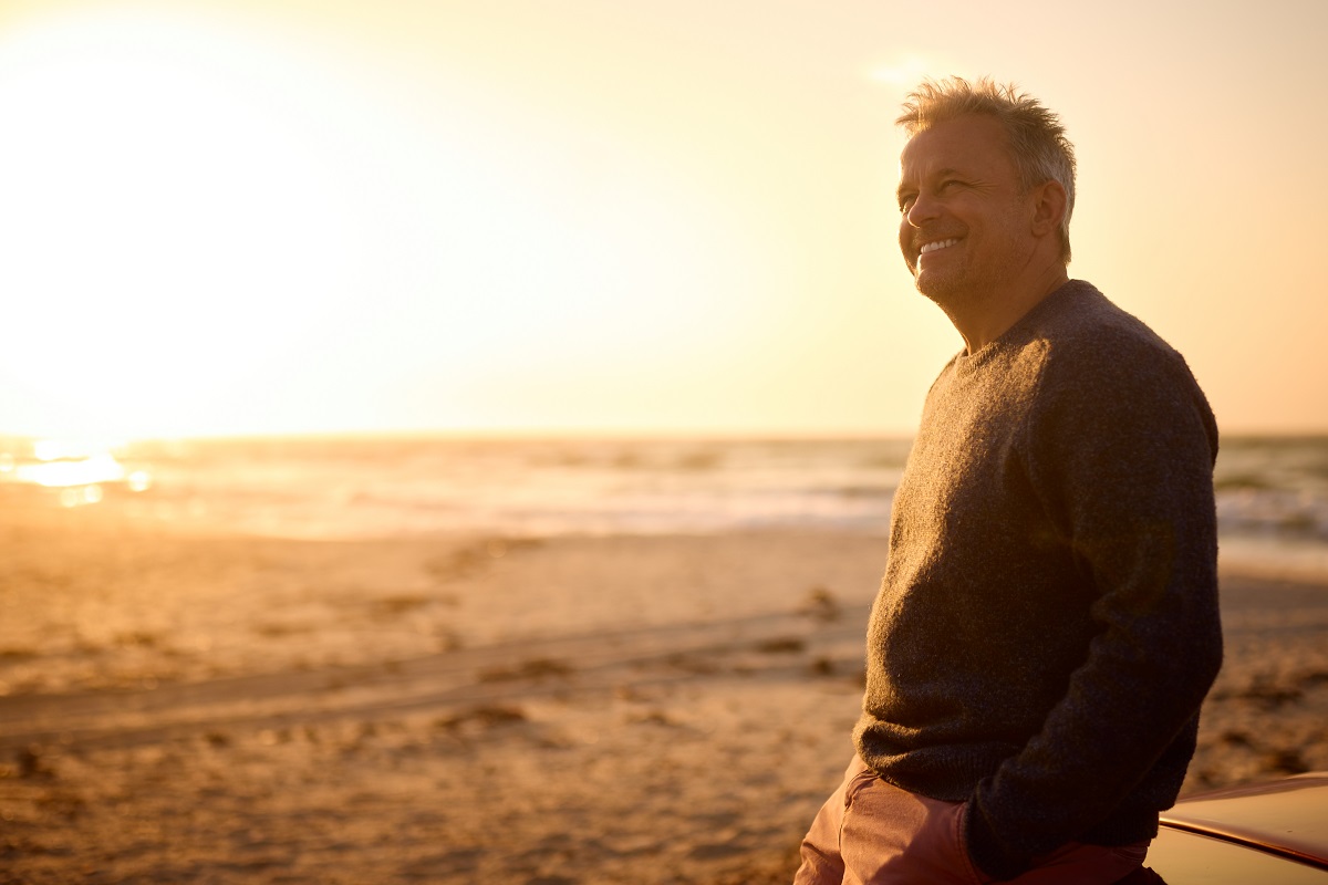 Man thinking on beach