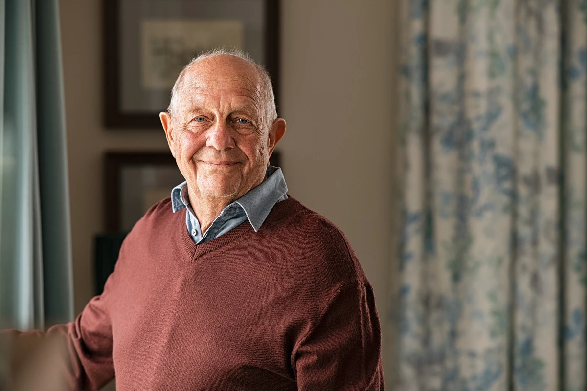 Content Elderly Man At Home