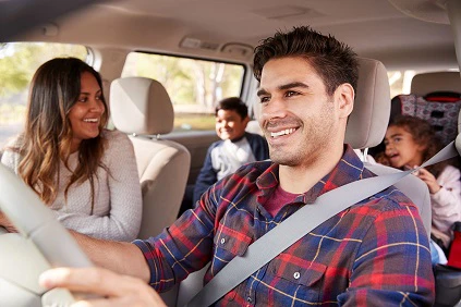 Young Family In Car