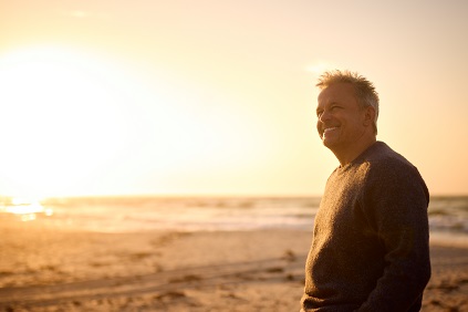 Man thinking on beach