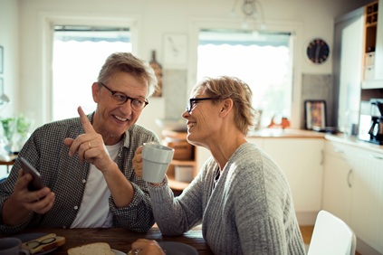 Retired couple enjoying breakfast together